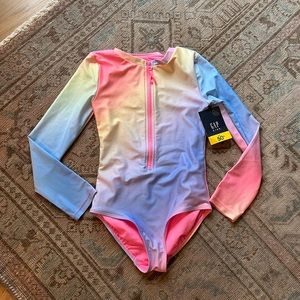 NWT.  Gap girls one piece long sleeve swim suit (size 8)